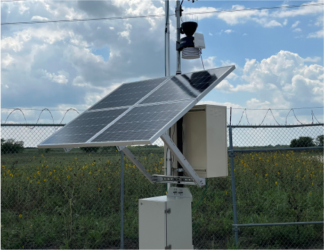 An image showing a GazPod methane detection and monitoring unit in the field, with autonomous solar power supply and networked capabilities.