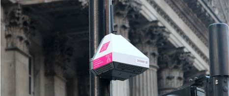 An image showing an unobtrusive AQMesh compact sensor pod in an urban location, probably London.